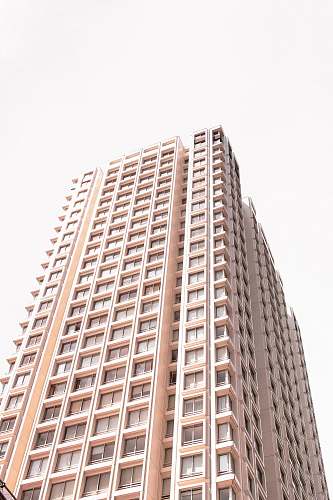 high rise beige high-rise building town